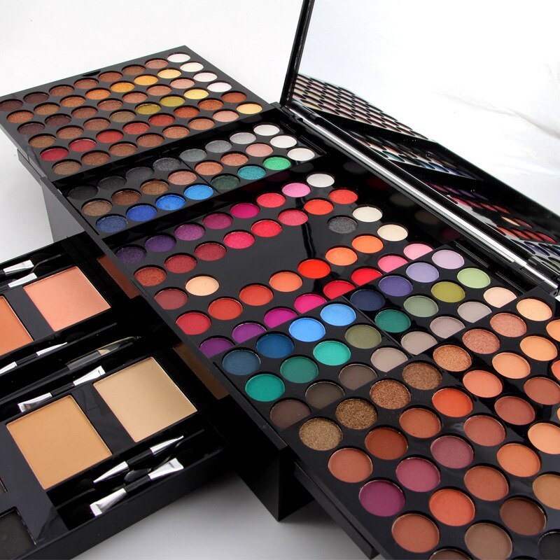 Makeup palettes with various colors on a white background