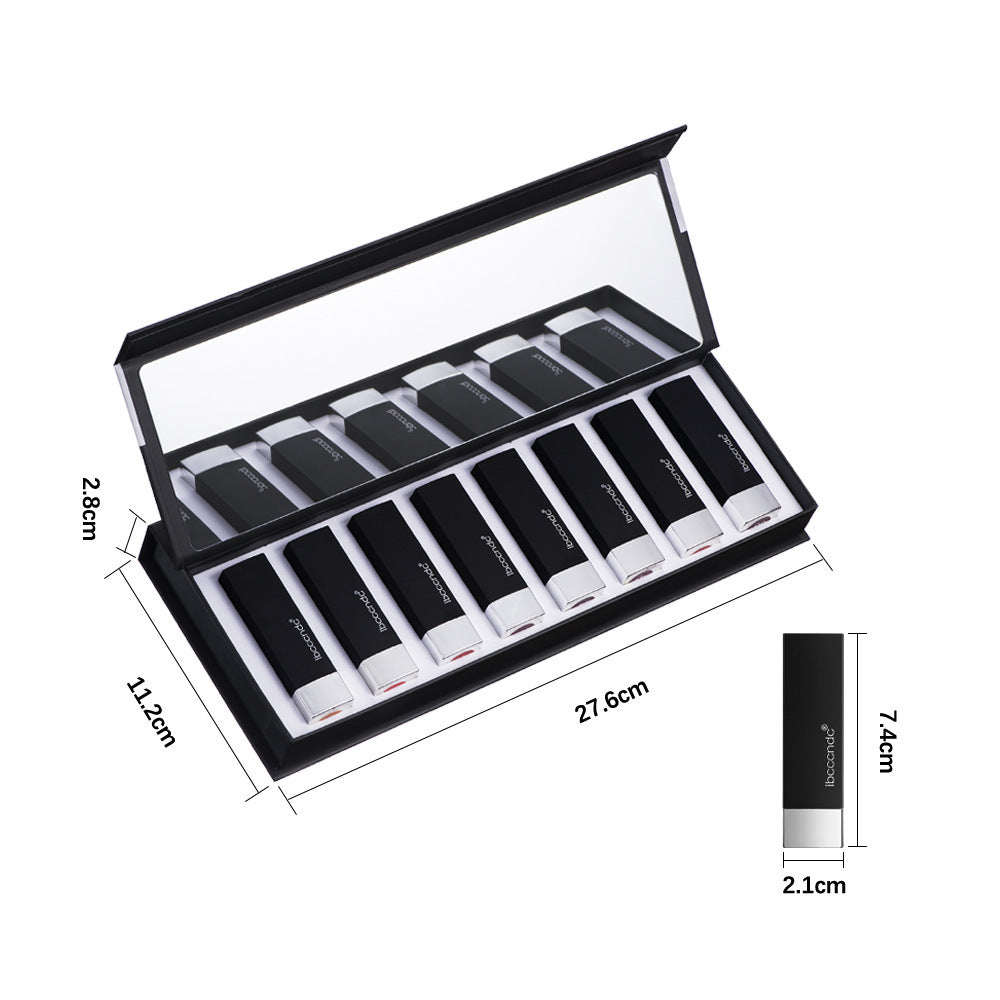 Set of black lipsticks in a display case with dimensions indicated.