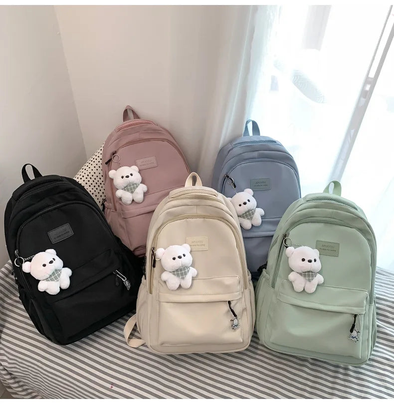 Student Japanese large-capacity backpack Girl simple and versatile backpack Unisex polyester material Doll decoration