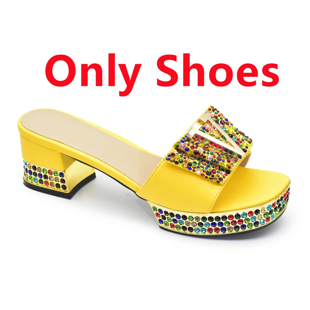 Yellow sandal with colorful embellishments on a white background with 'Only Shoes' text.