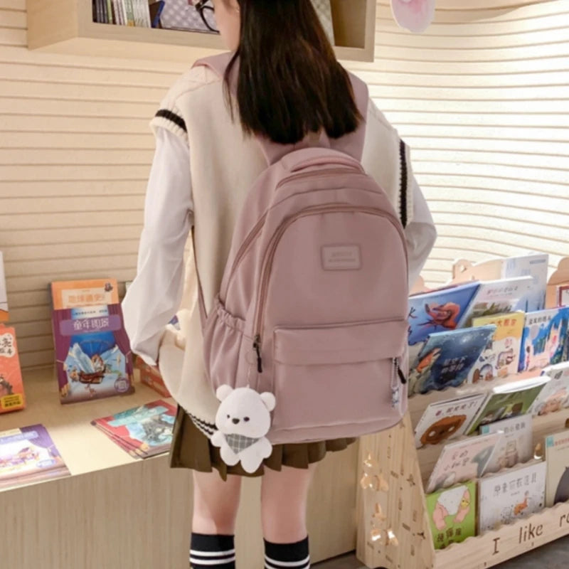 Student Japanese large-capacity backpack Girl simple and versatile backpack Unisex polyester material Doll decoration