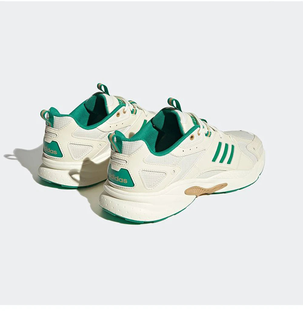 White and green sneakers on a white background