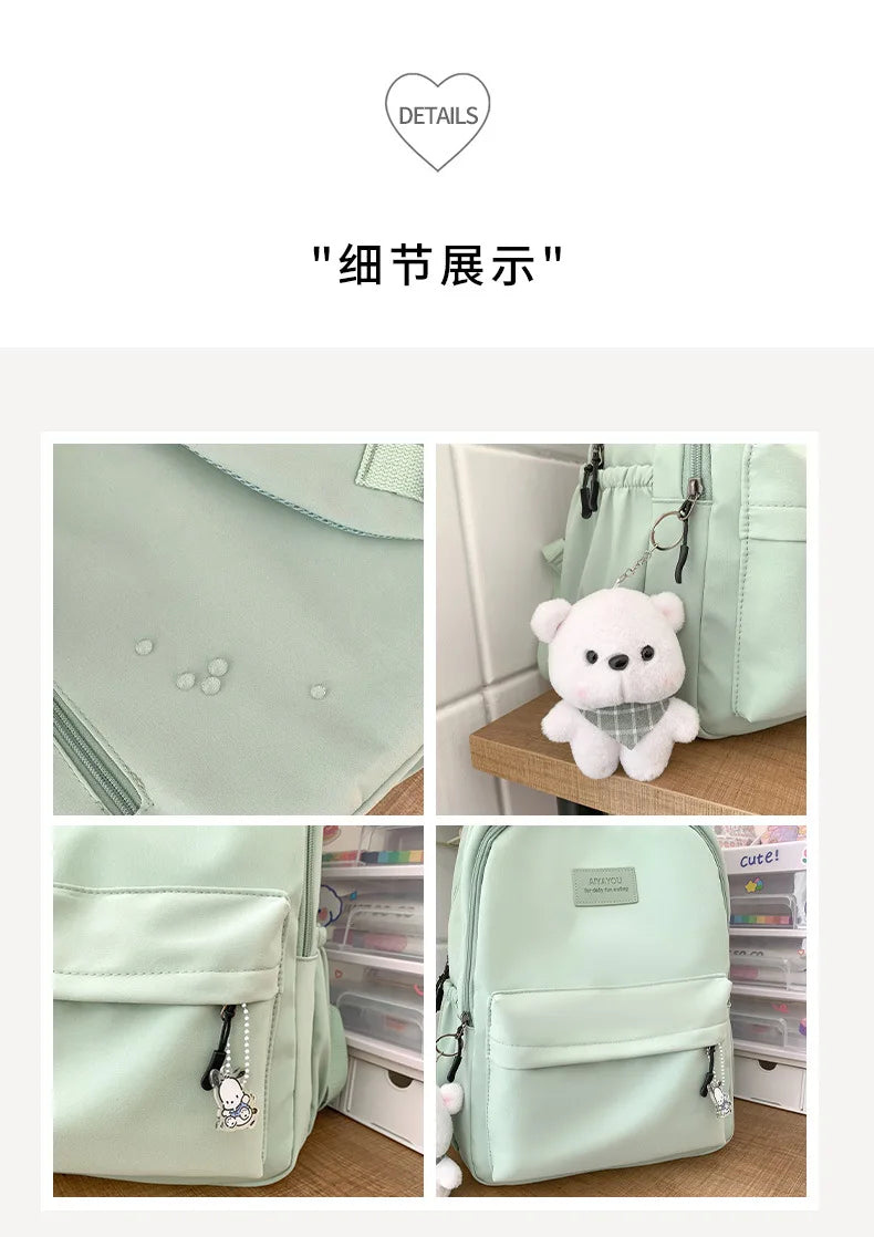 Student Japanese large-capacity backpack Girl simple and versatile backpack Unisex polyester material Doll decoration