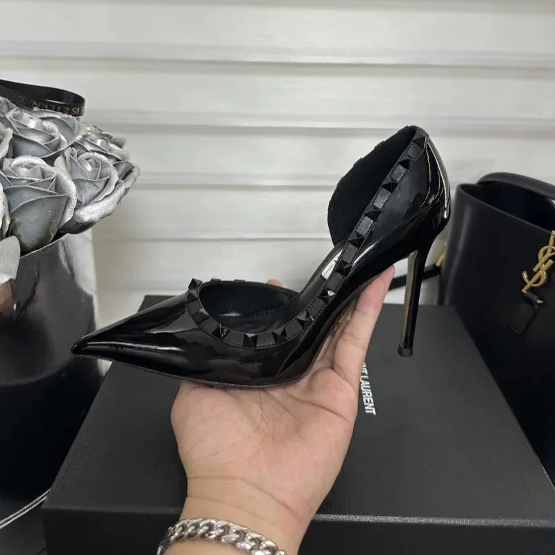 White high heels female 2025 spring and summer new side empty pointed rivets matching sexy slim heel shallow mouth single shoes