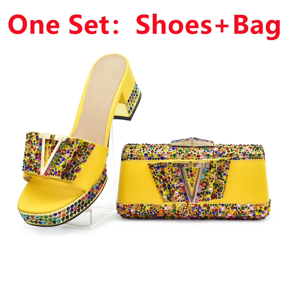 Yellow shoes and matching bag with colorful embellishments on a white background.