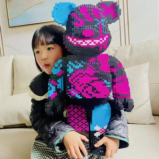 Child holding a colorful, pixelated bear toy on a couch