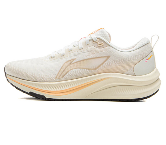White running shoe with orange accents.