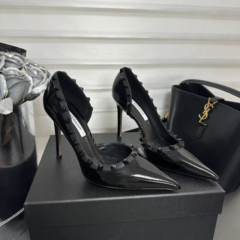 White high heels female 2025 spring and summer new side empty pointed rivets matching sexy slim heel shallow mouth single shoes