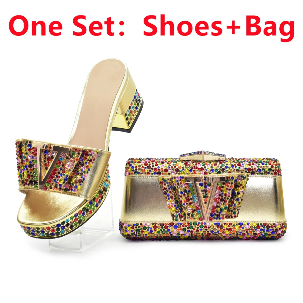 Gold high-heeled shoes with colorful embellishments and matching bag on a white background.